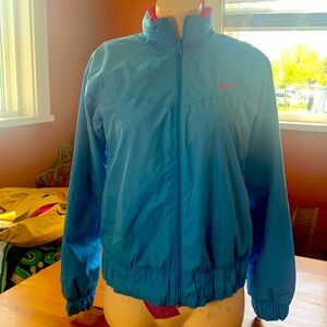 Reversible, blue and pink Nikes windbreaker from the 90s